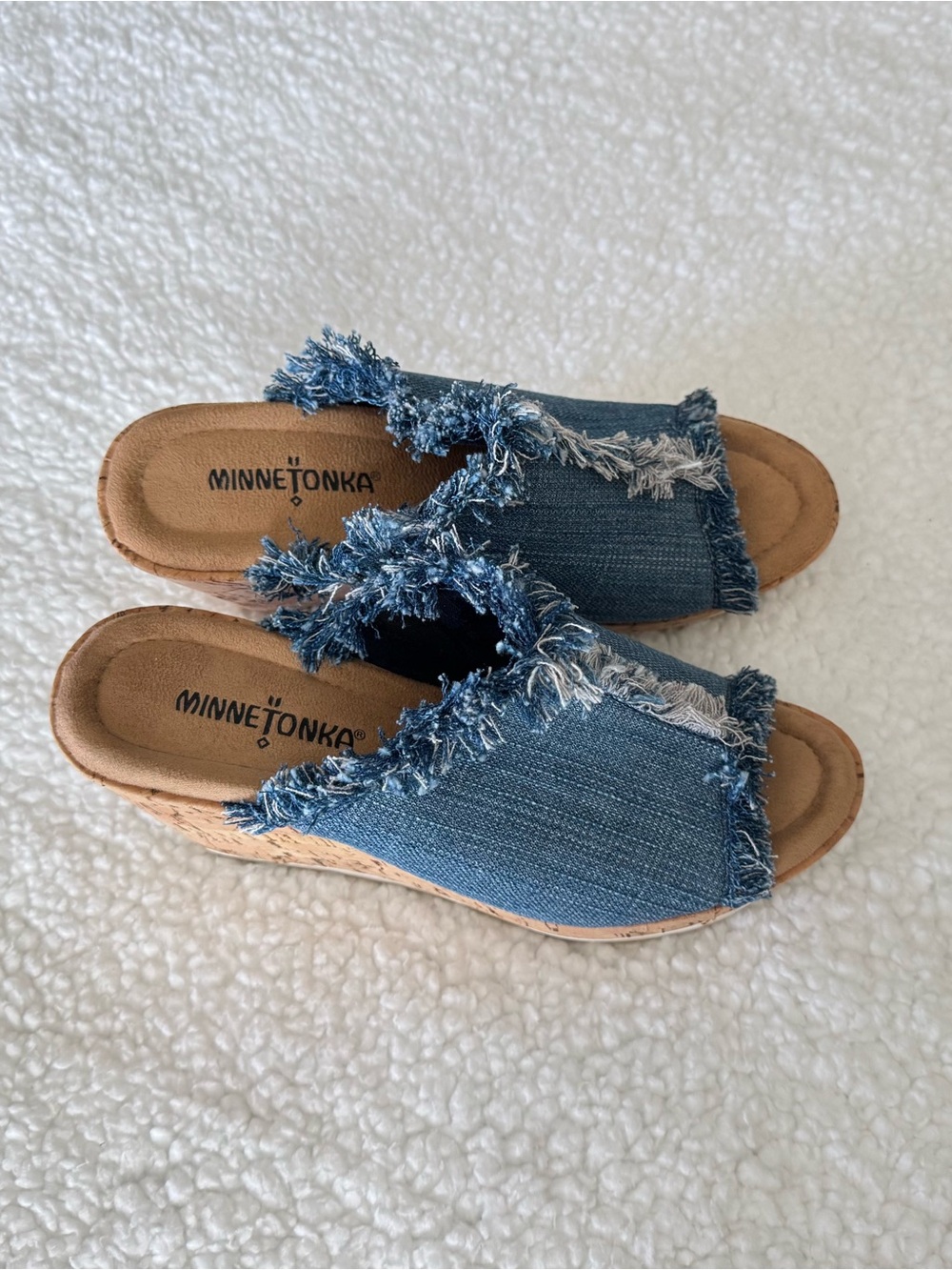 Minnetonka Blue Denim Frayed Slip-On Wedge